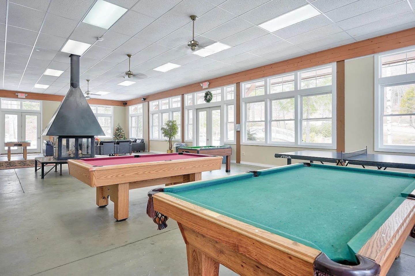 Game room including 2 pool, 2 bumper pool, and 1 ping pong table. Short 100yd walk from the condo.